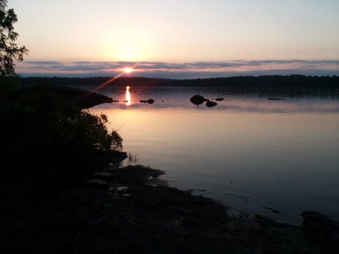 picture of sunset across the lake as we close at sunset on Fridays